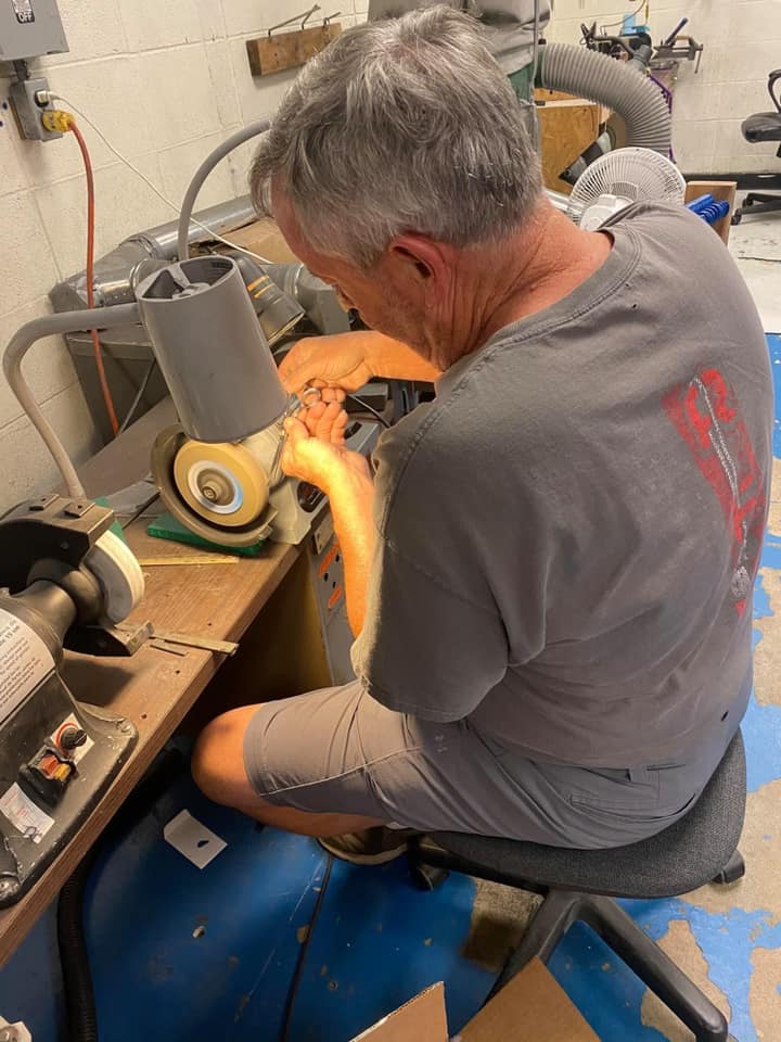 Jonathan working on grinder